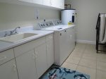 Large Laundry Room With Full Size Washer And Dryer
